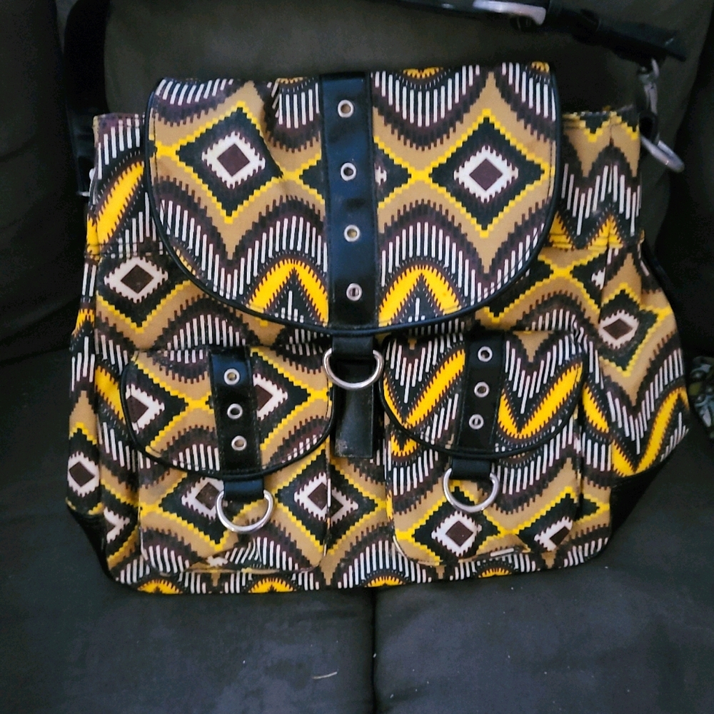 GIGI HILL COATED CANVAS BACKPACK